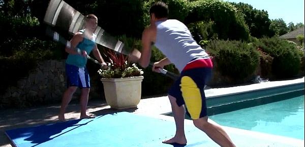  Gay muscular jocks sword fighting by the pool